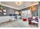 Stylish office with a large window, unique wallpaper, and a comfortable seating area at 3383 Norwich Rd, Fort Mill, SC 29715