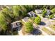 Bird's eye view of house surrounded by mature trees and neighboring homes at 3411 Xandra Ct, Indian Land, SC 29707