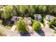 An aerial view of several houses with their manicured lawns on a sunny day at 3411 Xandra Ct, Indian Land, SC 29707