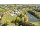 A vibrant aerial view of the community amenities and the lush greenery surrounding them at 3411 Xandra Ct, Indian Land, SC 29707