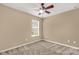 Bright bedroom with plush carpet and a window for natural light at 3411 Xandra Ct, Indian Land, SC 29707