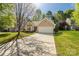 Charming single-story home with a well-maintained lawn and a two-car garage at 3411 Xandra Ct, Indian Land, SC 29707