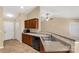 Bright kitchen offering essential appliances, functional cabinetry and breakfast bar seating at 3411 Xandra Ct, Indian Land, SC 29707