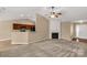 Inviting living area features a fireplace, an open layout, and adjacent kitchen space at 3411 Xandra Ct, Indian Land, SC 29707