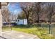 Backyard featuring a shed, wooden swing, and partially fenced yard, offering a private outdoor space at 394 Efird St, Gastonia, NC 28054