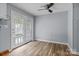 Bright dining space featuring a ceiling fan and easy access to an outdoor area at 394 Efird St, Gastonia, NC 28054