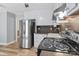 Modern kitchen with stainless steel appliances, ample counter space, and contemporary finishes at 394 Efird St, Gastonia, NC 28054
