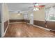 Bright living room featuring hardwood floors and a ceiling fan at 394 Efird St, Gastonia, NC 28054