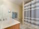 This bathroom has a practical design and includes a shower, tub, and vanity at 4130 Town Center Rd, Harrisburg, NC 28075
