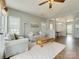 Open-concept design of the dining room features hardwood floors and neutral walls and natural light at 4130 Town Center Rd, Harrisburg, NC 28075