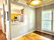 Dining room with a view into the kitchen with stainless appliances at 4130 Town Center Rd, Harrisburg, NC 28075