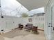 Cozy outdoor patio area illuminated with string lights, perfect for relaxing and dining at 4130 Town Center Rd, Harrisburg, NC 28075