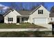 Charming single-Gathering home with a two-car garage and well-manicured lawn at 5126 Rocky River Crossing Rd, Harrisburg, NC 28075