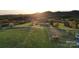 Beautiful aerial view of property surrounded by green fields and distant mountains at 5373 Nc Hwy 16 N Hwy, Taylorsville, NC 28681