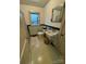 Classic bathroom with a vintage sink, toilet, and window for natural light at 5373 Nc Hwy 16 N Hwy, Taylorsville, NC 28681