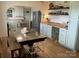 Open kitchen featuring a breakfast bar with seating, pendant lighting and butcher block countertop at 5373 Nc Hwy 16 N Hwy, Taylorsville, NC 28681