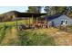 Functional outbuilding with covered storage and a fenced area, suitable for various outdoor activities at 5373 Nc Hwy 16 N Hwy, Taylorsville, NC 28681