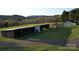 Spacious property featuring multiple outbuildings, providing ample storage and functional space at 5373 Nc Hwy 16 N Hwy, Taylorsville, NC 28681