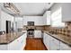 Bright kitchen with granite countertops, stainless steel appliances, and tile backsplash at 6115 The Meadows Ln, Harrisburg, NC 28075