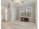 Bright bedroom with an open doorway to an ensuite bathroom at 6654 Maple Spring Ct, Denver, NC 28037