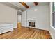 Bedroom with hardwood floors and built-in fireplace at 6654 Maple Spring Ct, Denver, NC 28037