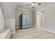 Bonus room or flex space with a blue armoire at 6654 Maple Spring Ct, Denver, NC 28037