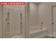 Bathroom with a shower and separate soaking tub at 7330 Stonehouse Dr, Gastonia, NC 28056