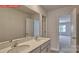 Bathroom with double sinks and a large mirror at 7330 Stonehouse Dr, Gastonia, NC 28056