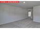 Spacious bedroom featuring neutral carpet and an open doorway to the next room at 7330 Stonehouse Dr, Gastonia, NC 28056