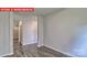 Bright hallway with hardwood floors leading to rooms at 7330 Stonehouse Dr, Gastonia, NC 28056