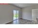 A spacious room features a sliding glass door that provides plenty of natural light at 7330 Stonehouse Dr, Gastonia, NC 28056