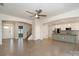 Open-concept living area showcasing hardwood floors, recessed lighting, and seamless transition to the kitchen at 829 River Park Rd, Belmont, NC 28012