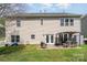 Back of house with patio, pergola, and lawn at 9013 Gailes Dr, Charlotte, NC 28278