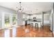 Open kitchen featuring an island with bar seating and stainless steel appliances at 9013 Gailes Dr, Charlotte, NC 28278