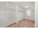Walk-in closet with ample shelving and rod space, providing plenty of storage at 9013 Gailes Dr, Charlotte, NC 28278