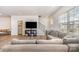 Inviting living room featuring neutral tones, wood floors, and lots of natural light at 9654 Old Garden Cir, Gastonia, NC 28056