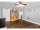 Empty office space features hardwood floors, neutral paint, and natural light at 9718 Barkridge Rd, Mint Hill, NC 28227