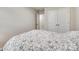 Bedroom with a bed and a closet with double doors leading to the hallway at 10002 Brittondale Ln, Charlotte, NC 28215