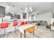 Open concept living space with a kitchen, dining area, and cozy living room at 10002 Brittondale Ln, Charlotte, NC 28215