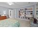 Bedroom with bookcases, dresser, and access to second floor at 104 Chalfont Ct, Salisbury, NC 28147