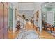 Elegant foyer with hardwood floors, staircase, and traditional decor provides a grand entrance to the home at 104 Chalfont Ct, Salisbury, NC 28147