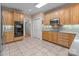 Bright kitchen with stainless steel appliances and plenty of cabinet storage space at 104 Chalfont Ct, Salisbury, NC 28147