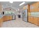Spacious kitchen features stainless steel appliances, and tiled floors at 104 Chalfont Ct, Salisbury, NC 28147