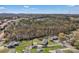 Neighborhood aerial view featuring mature trees, lawns, and a view of a lake at 109 Connor Ct, Kings Mountain, NC 28086