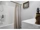 Bathroom featuring a white vanity, decorative lighthouse, and shower with neutral curtain at 109 Connor Ct, Kings Mountain, NC 28086