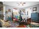 Charming bedroom showcases hard wood floors, two windows, and a colorful four-post bed frame at 109 Connor Ct, Kings Mountain, NC 28086