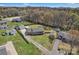 Aerial view of a beautiful home with large manicured lawn, detached garage and mature trees at 109 Connor Ct, Kings Mountain, NC 28086