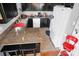 This kitchen features dark cabinets, stainless steel appliances and neutral countertops at 109 Connor Ct, Kings Mountain, NC 28086