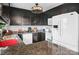 This kitchen features dark cabinets, stainless steel appliances and neutral countertops at 109 Connor Ct, Kings Mountain, NC 28086