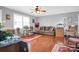 Bright living room with hardwood floors, neutral walls, and large windows at 109 Connor Ct, Kings Mountain, NC 28086